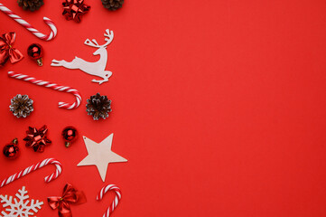 Christmas,New Year's layout on a red background. Concept of christmas, winter, new year. Flat lay, top view. Copy space.