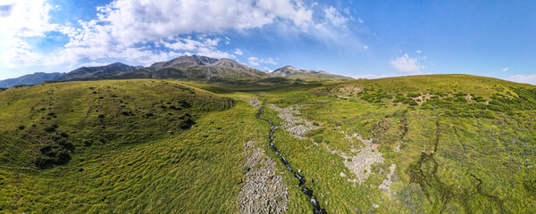 panoramic view of the mountain plateau. summer mountains. green mountain hills