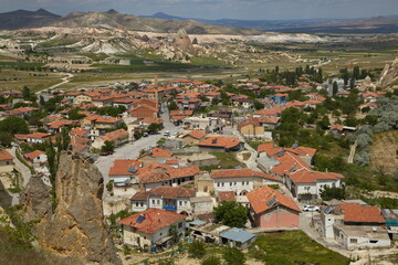 Fototapeta na wymiar View of Cavusin from the rock ridge in Cappadocia,Nevsehir Province,Turkey 