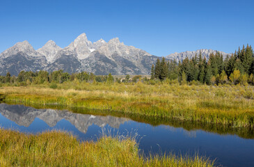 Fototapeta na wymiar Scenic Autumn Reflection Landscape in Grand Teton National Park Wyoming