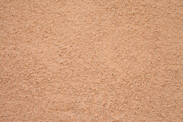 light brown background with dots