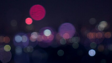 Defocused colorful glowing cityscape lights