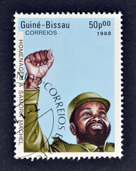 Cancelled postage stamp printed by Guinea Bissau, that shows Samora Machel (1933-1986), President...