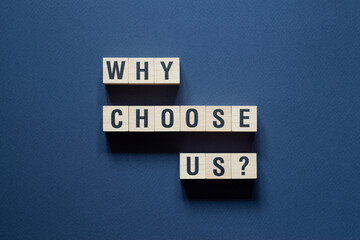 Why choose us - word concept on cubes