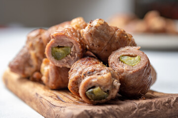 Meat rolls stuffed with mustard and pickled cucumber braised in gravy