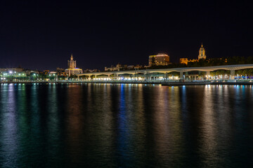 Naklejka na ściany i meble Night view of port in Malaga, Spain on November 24, 2022