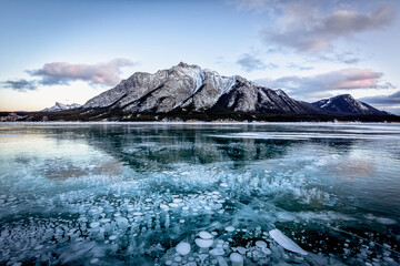 Fototapeta na wymiar Frozen bubbles in Canadian Rockies, Abraham Lake, Banff National Park