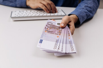 Businessman with euro banknotes. Bribery and corruption concept