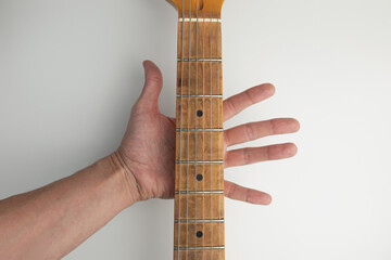 open palm and guitar fingerboard