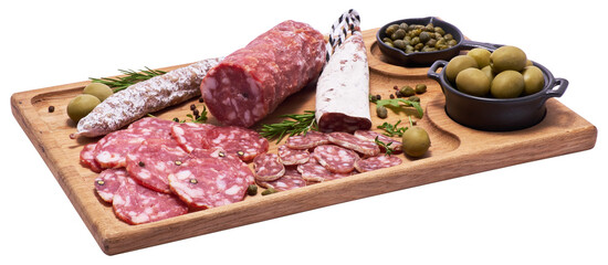 Spanish Fuet thin dried salami sausage on wooden cutting board