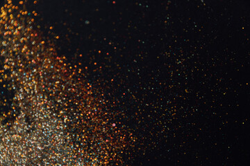 Abstract background of blurred colourful glitter for design. Lights bokeh dis focus. Christmas background, copy space