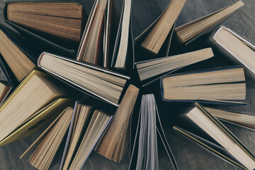 Top view of many books. Culture, reading, library, information and editorial concept. Background.