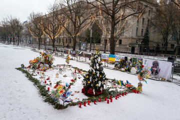 candles and flowers were laid in front of the Russian embassy in Berlin
