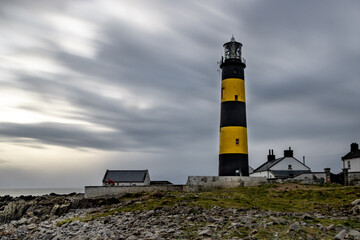 John's Point lighthouse on the rocks, long exposure. Northern Irelan, UK