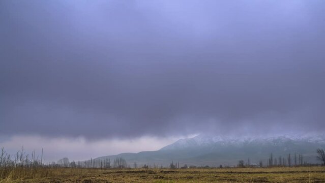 Dramatic dreamy fog and clouds on a cold morning in the mountains.
