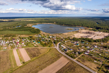 panoramic aerial view of private development with country houses or village