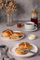 Food photography of hot cross bun, raisin, butter, english, tea, symbol, bread, pastry