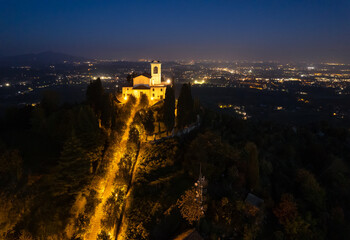 Aerial view of sanctuary of Beata Vergine del Carmelo at night, Montevecchia, Lecco, Lombardy, Italy