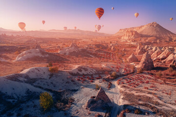 Panoramic view of Goreme national park with over deep canyons, valleys sunset Cappadocia sunset...
