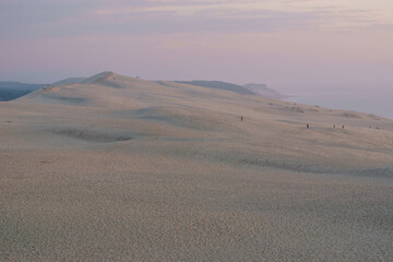 Sandy dune du Pilat, the biggest sand dune in Europe during the twilight of the sunset Arcachon, Nouvelle-Aquitaine, France