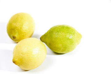 Composition with whole yellow lemon isolate. Lemon on white background