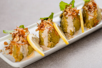 kashke bademjan served in dish isolated on grey background top view of arabic food