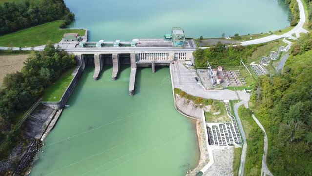 Aerial drone view of the water power plant Endling at the river Drau	

