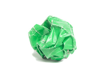 Crumpled green paper ball isolated on white