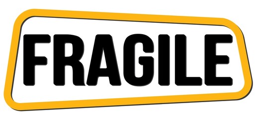 FRAGILE text on yellow-black trapeze stamp sign.