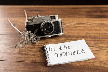 The inscription in the moment and the old camera