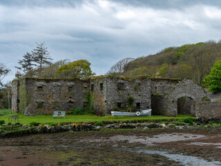 Fototapeta na wymiar The ruins of Arundel grain store on the shore of Clonakilty Bay. An old stone building. Historical monument. Tourist attractions