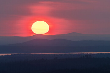 Beautiful midsummer sunrise in wilderness near Kuusamo, Northern Finland