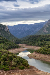Obraz na płótnie Canvas River and Mountain Landscape Nature Background. Sardinia, Italy.