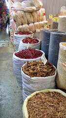 Sacks of dried chilies in a market in Oaxaca, Mexico