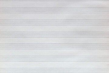 Lined sheet texture for musical notes, background.