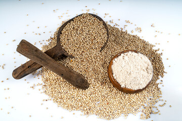 Top view of Sorghum grains and sorghum flour on white background,Healthy food sorghum for diet - obrazy, fototapety, plakaty