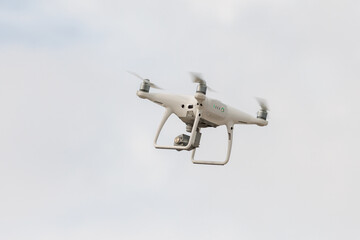 Uav drone flying with digital camera and filming environment. 