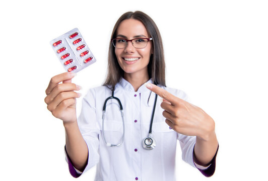 selective focus of doctor point finger on medication pill. photo of doctor holding medication pill.