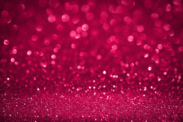 Viva Magenta bokeh lights background. Unfocused abstract red glitter holiday background. Christmas, Valentines day design element. Mock up. Winter xmas holidays wallpaper. Color of year 2023.