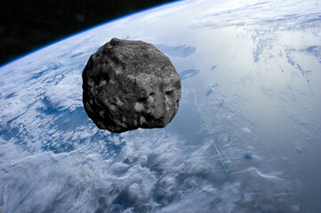 Asteroid approaching planet Earth. This image elements furnished by NASA. 