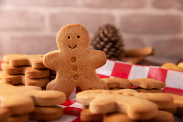 Homemade gingerbread man cookies closeup, traditionally made at Christmas and the holidays.