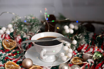 a cup of coffee in a Christmas atmosphere