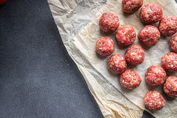 Fototapeta na wymiar fresh meatballs raw meat pork, beef, lamb meat balls snack meal food on the table copy space food background rustic top view