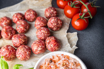 fresh meatballs raw meat pork, beef, lamb meat balls snack meal food on the table copy space food background rustic top view