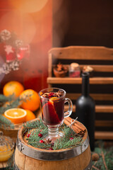 Hot wine with spices in the New Year's decor