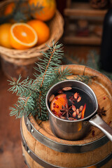 Hot wine with spices in the New Year's decor