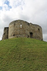 Fototapeta na wymiar View to Clifford's Tower of York Castle in York, England United Kingdom