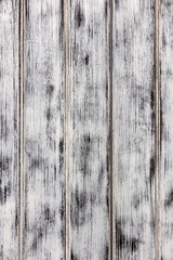 Background texture of old wooden door with faded peeling paint