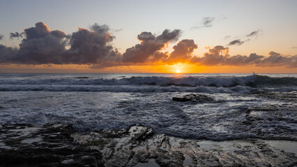 Sunrise view in the ocean horizon.