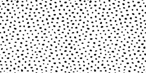 Dot seamless pattern. Irregular dots background. Repeating scattered spots texture for design prints.Repeated hand drawn spot. Black polka on white backdrop. Repeat hands points. Vector illustration © Omeris